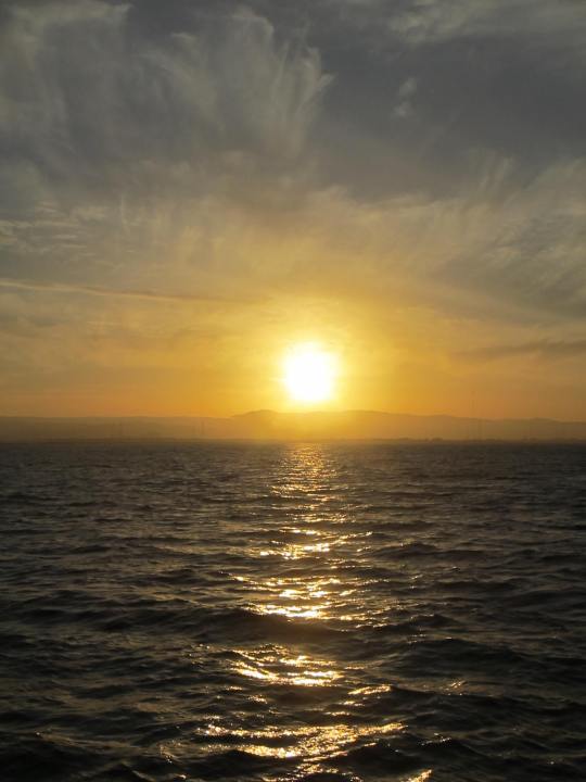 A lemon-drop summer sunset over the San Francisco Bay